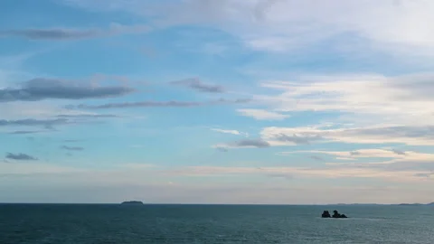 Timelapse of the colorful sunset view at the beach with ocean waves and clouds. Stock Footage 248945852