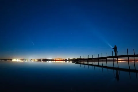 Timelapse of Comet (Tsuchinshan-ATLAS) flight in the reflection of a lake Stock Footage 305293953