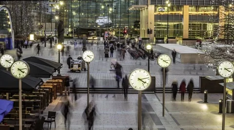 Timelapse of commuters and clocks Stock Footage
