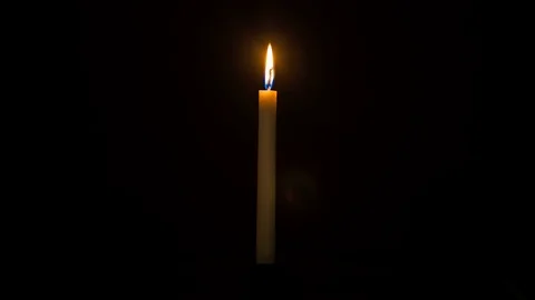 Timelapse Complete burning of the candle from start to finish in the dark 動画素材 73924036