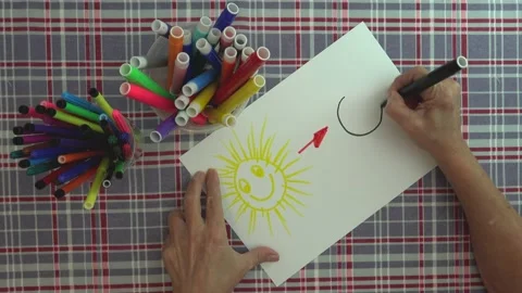 Timelapse. Conceptual. Hand drawing a virus, with black marker on paper. Stock Footage 130539000