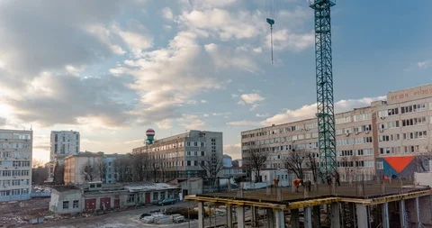 Timelapse with the construction crane over beautiful clouds Stock Footage 124556551