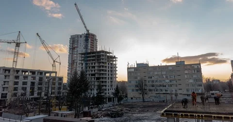Timelapse with the construction crane over beautiful clouds Stock Footage 124582875