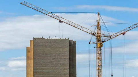 Timelapse construction cranes, building against moved cloud at blue sky Stock Footage 65139073