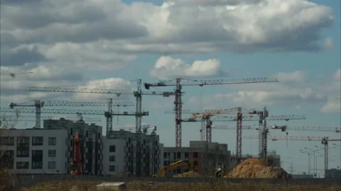 Timelapse construction cranes on the construction of new houses Stock Footage 196263133