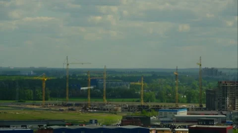 Timelapse construction cranes on the construction of new houses Stock Footage 197486781