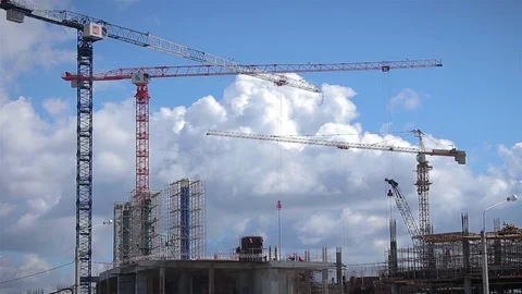 Timelapse of construction cranes working on stadium construction site Stock Footage 71250421