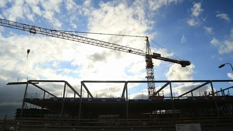Timelapse Construction Crew Lowering Steel Girders into Place Stock Footage 95781371