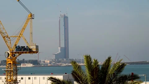 Timelapse of construction progress at Wynn Casino on Al Marjan Island under.. Vidéo 333707047