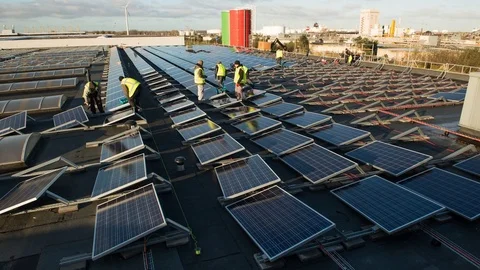 Timelapse construction on rooftop of solarpanel field  Video stock 84759834