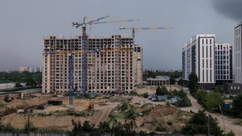 Timelapse of Construction Site with High-Rise Building During Approaching S.. Stock Footage 340631679