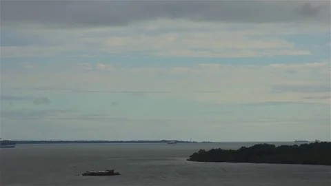 Timelapse of a container ship leaving port 스톡 동영상 75176577