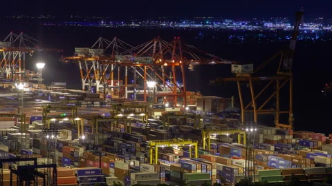 Timelapse container terminal in Tokyo harbour at night Stock Footage 116630598
