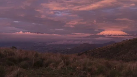 Timelapse of Cotopaxi Volcano with Dramatic Sunset Light and Moving Clouds Stock Footage 303135553