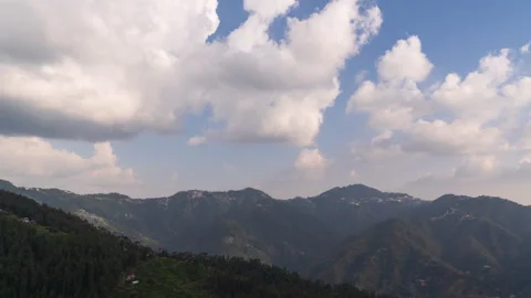 Timelapse - Cotton candy clouds over mountains 4K60 Stock Footage 268061087