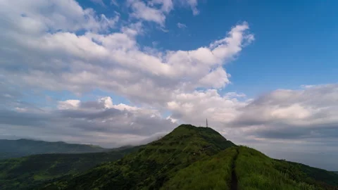 Timelapse - Cotton candy clouds over mountains 4K60 Stock Footage 269124612