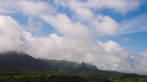 Timelapse - Cotton candy clouds over the mountains 4K60 Stock Footage 270320835