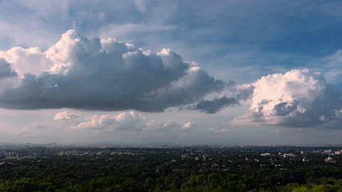 Timelapse - Cotton candy clouds over a city 4K60 Stock Footage 271199790