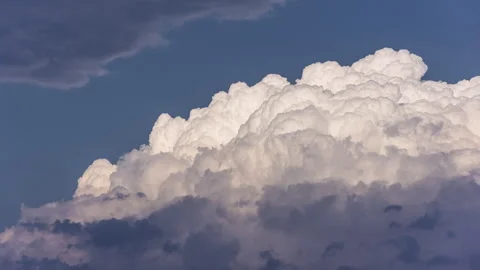 Timelapse - Cotton candy clouds rising closeup 4K60 Stock Footage 271018415