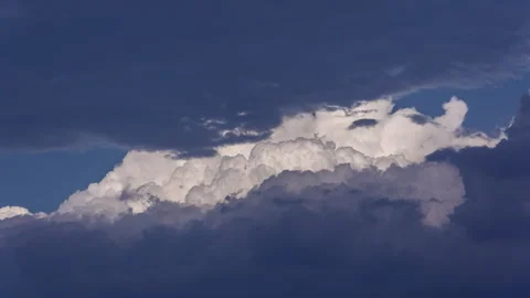 Timelapse - Cotton candy clouds rising closeup 4K60 Stock Footage 271018501