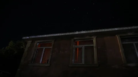 A timelapse of a country house by night Stock Footage
