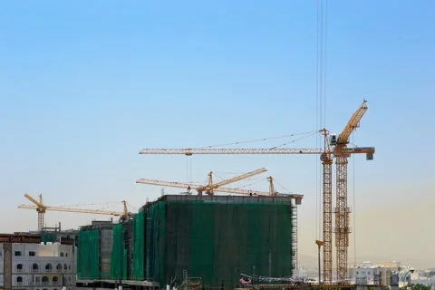 Timelapse of crane in a construction site in Al Ghubrah South area, Muscat Stock Footage 45196419