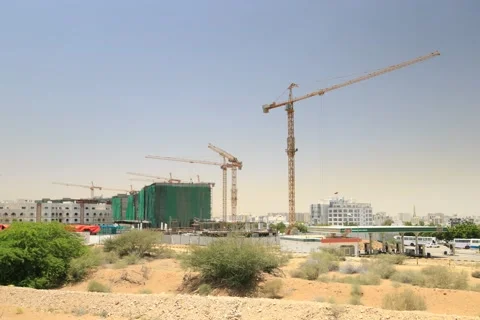 Timelapse of crane in a construction site in Al Ghubrah South area, Muscat Stock Footage 45196437
