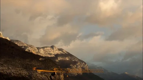 Timelapse, crane in winter in front of mountain and Annecy lake, France Stock Footage 71882022