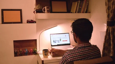 Timelapse creative man male freelancer working on laptop at home drinking coffee Stock Footage 129735890
