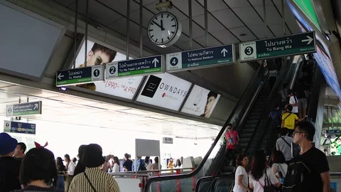 Timelapse of Crowd of Commuters on escalator at Siam BTS Skytrain Station Stock Footage 115959923