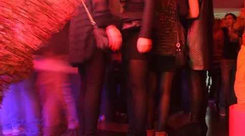 Timelapse of crowd in night club from the back enjoying music Stock Footage
