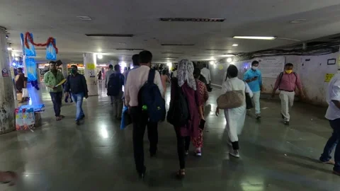 Timelapse of a Crowd of People Walking inside a busy underground subway, Mumbai Stock Footage 150793777