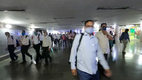Timelapse of a Crowd of People Walking inside a busy underground subway, Mumbai Stock Footage 150793844