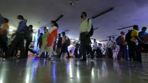 Timelapse of a Crowd of People Walking inside a busy underground subway, Mumbai Stock Footage 150794174