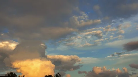 Timelapse of Cumulonimbus Clouds During Sunset Stock Footage 111352111