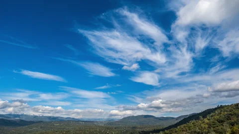 Timelapse of Cumulus and Cirrus Clouds Crossing the Sky Stock Footage 278268245