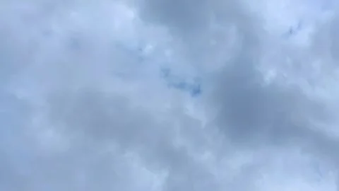 A timelapse of cumulus clouds in a blue sky landscape. Stock Footage 303073409