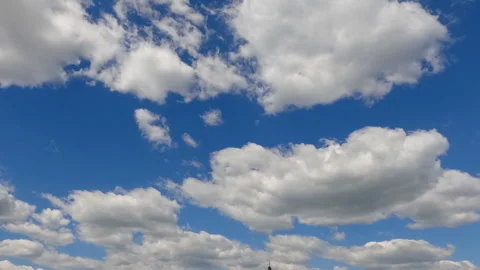 Timelapse of cumulus clouds moves in the blue sky. Stock Footage 334417009