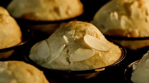 Timelapse cupcakes, muffins baking and rising in muffin tin in electric oven in Stock Footage 336576489