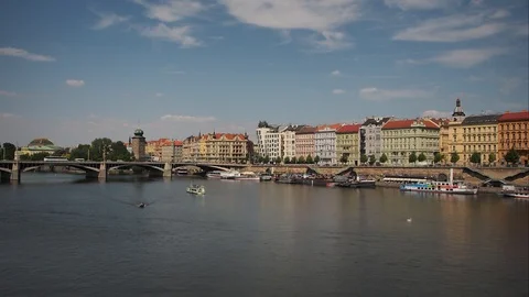 Timelapse of the Dancing House with Traffic passing along the Vltava Stock Footage 93110629