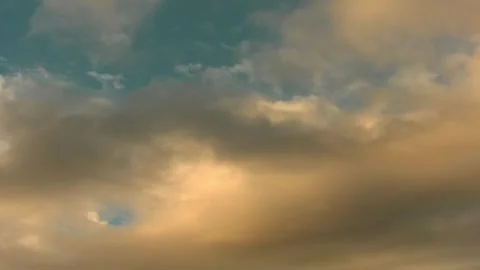 Timelapse: dark and bright clouds moving in a blue sky, autumn evening Stock Footage 256345385