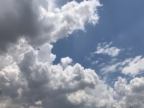 Timelapse Of Dark and White Clouds In Blue Sky Stock Footage 78041678