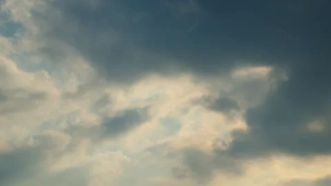 Timelapse of dark cloud movement in the afternoon approaching sunset Stock Footage 320924429