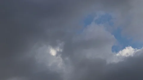 Timelapse of dark cloud passing Stock Footage 128494944