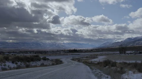 Timelapse-Dark clouds building over small mountain town Stock Footage 143164645