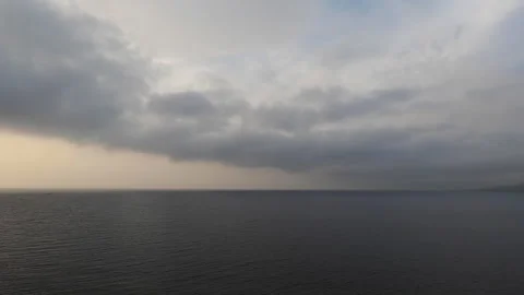 Timelapse of dark clouds moving over the sea Stock-Footage 156934702