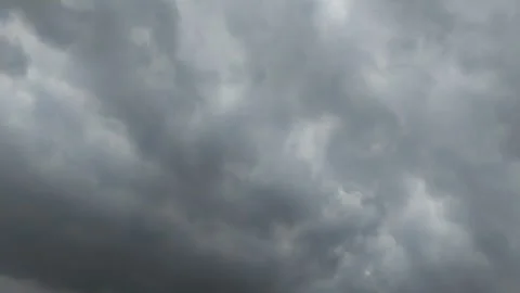Timelapse of dark dramatic clouds that are about to rain 動画素材 295600613