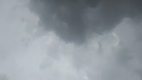 Timelapse of dark dramatic clouds that are about to rain 動画素材 295600629