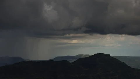 Timelapse - Dark monsoon storm coluds over a mountain 4K60 Stock Footage 270144141