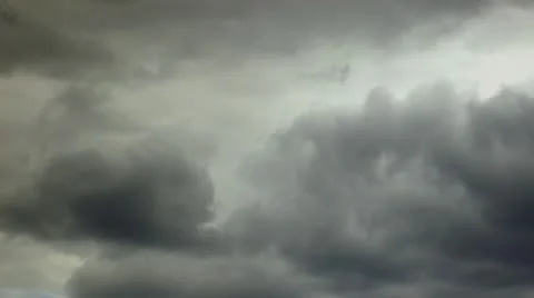 Timelapse dark rainclouds moving in sky Stock Footage 10570413